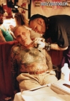 Emil being tattooed by Danny